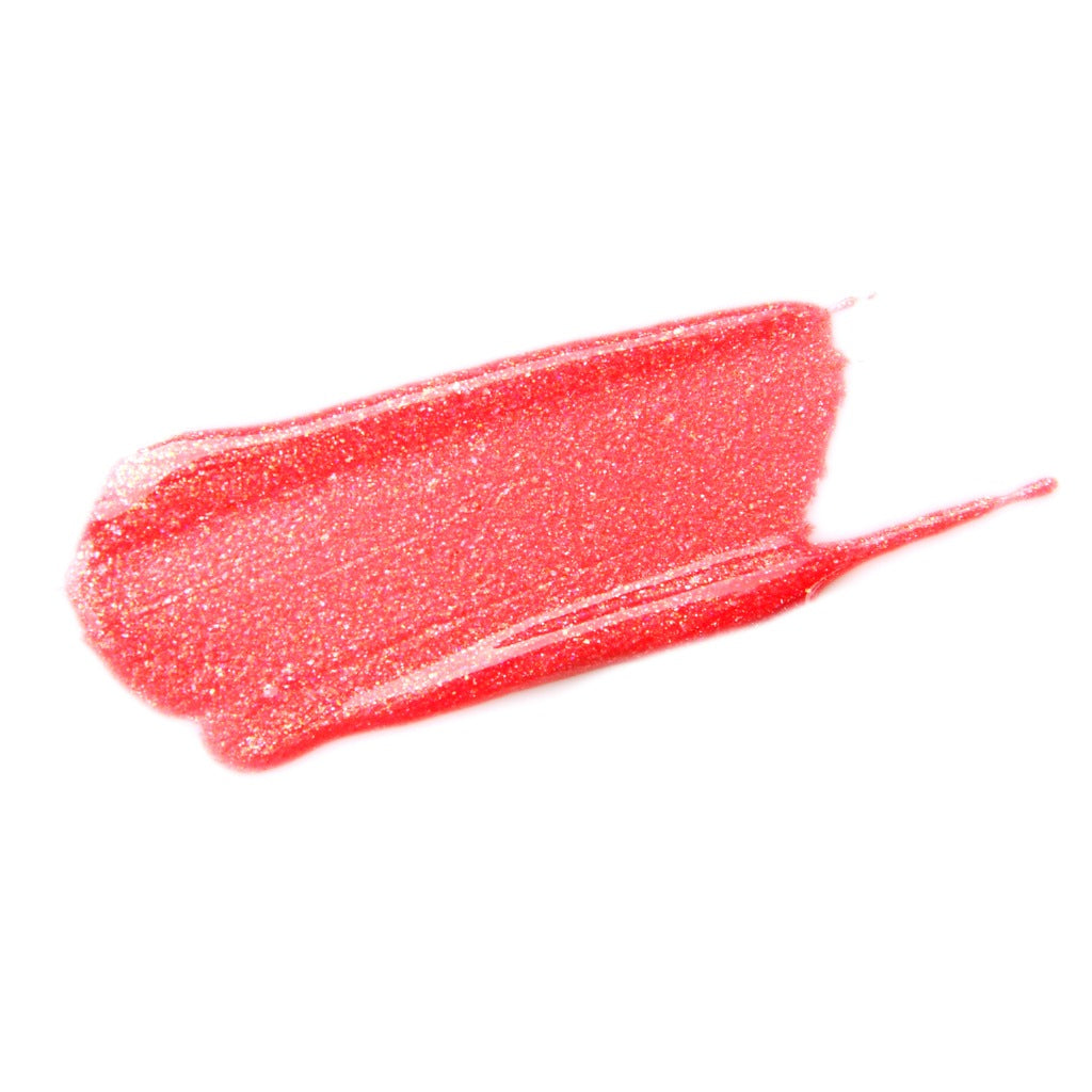 Close-up of Pink Lippie lip gloss texture showing its bold, glossy consistency for plump lips